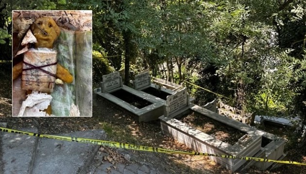 Mezarda bal mumundan bebek ve muska bulundu