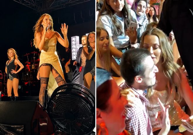 Hadise sahneden inip hayranını öptü